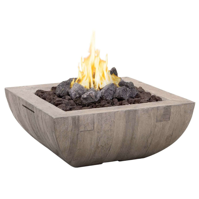 Fire pit with flames and rocks on a white background