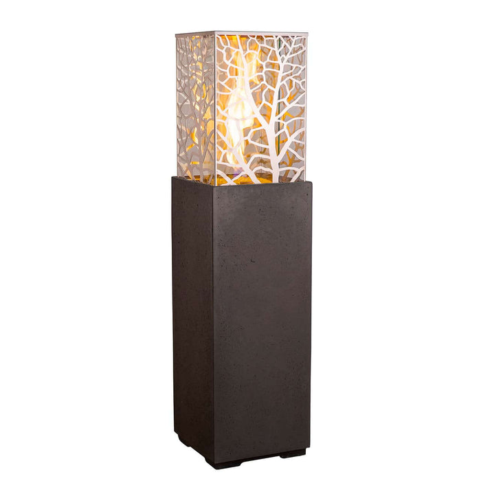 Tall floor lamp with a decorative glass shade on a white background