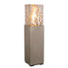 Tall floor lamp with a decorative glass shade on a white background