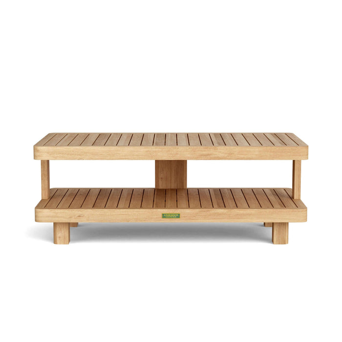 A rectangular teak wood coffee table with a lower shelf, featuring a modern design with a smooth, sanded finish.